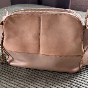 Able Leather crossbody bag in light stone.
